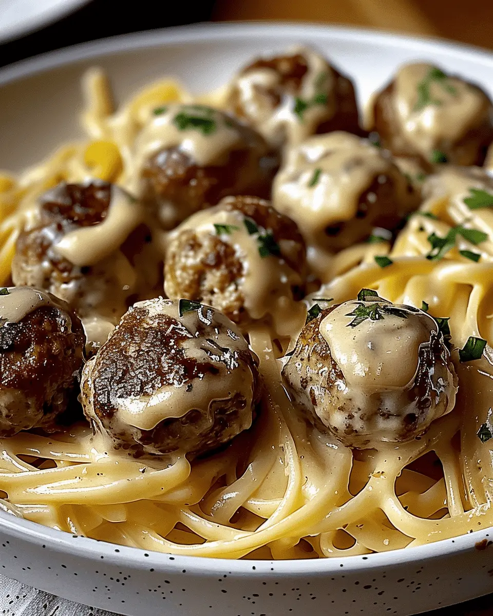 Garlic butter meatballs served over creamy parmesan linguine: Easy and Indulgent Dinner Delight